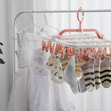 Uscator de Rufe Suspendat Vivimall, cu 40 Carlige, Rotire 360 Grade, Protectie Vant, Pliabil, Patrat, Mateiral Plastic, Usor de Depozitat, Multifunctional, 36 x 24 cm, Alb/Roz - vivimall.ro
