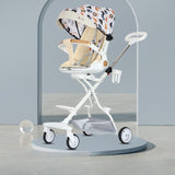 Carucior Sport Vivimall 3in1, 6-36 Luni, Reversibil, Pliabil, Tavita pentru Masa, Pozitie de Somn, Centura de Siguranta, Roti 360, Suport Pahar, Copertina pentru Soare, 32x63x95cm, Crem Model Jungla - vivimall.ro