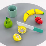 Felii de fructe din lemn incluse în setul Flippy: lămâie, căpșună, pară și banană, vedere de sus